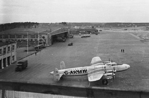 A British Lancastrian standing as the only plane in front of a hangar at Gatow airfield.