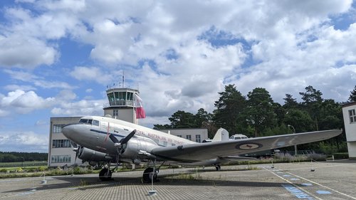 Aircraft in front of building
