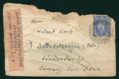 An envelope with a German address and a British stamp, featuring King George VI.